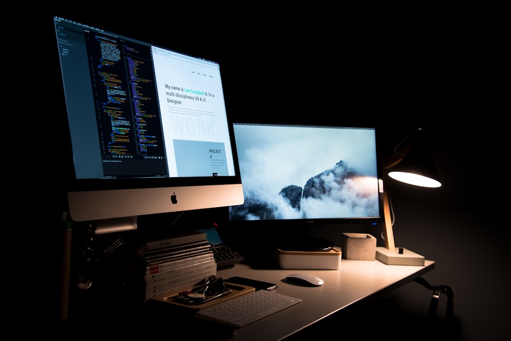 Website design and code on a desktop workstation